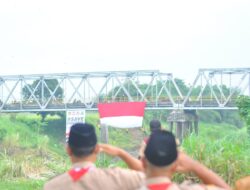 BENDERA MERAH PUTIH RAKSASA BERKIBAR DI BUMI ANGKAWIJAYA LOSARI